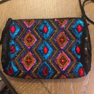 Sequin beaded colorful evening small purse with black background